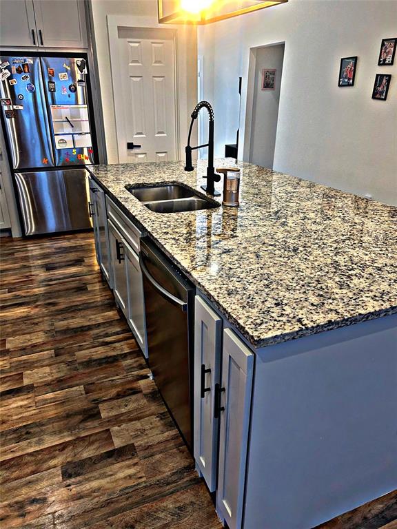 2631 Fish Tank Road Corsicana, TX 75110 - Photo 12 of 40 a kitchen with sink and stove