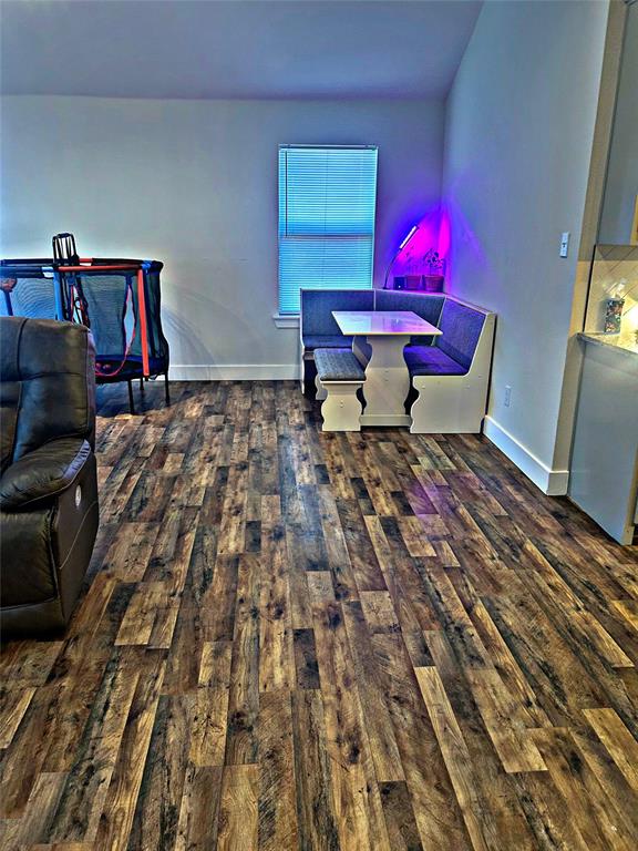 2631 Fish Tank Road Corsicana, TX 75110 - Photo 13 of 40 a bed room with a bed furniture and a potted plant