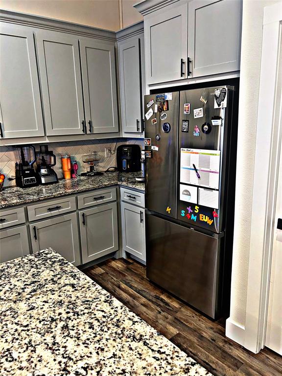 2631 Fish Tank Road Corsicana, TX 75110 - Photo 14 of 40 a kitchen with stainless steel appliances a refrigerator and a stove