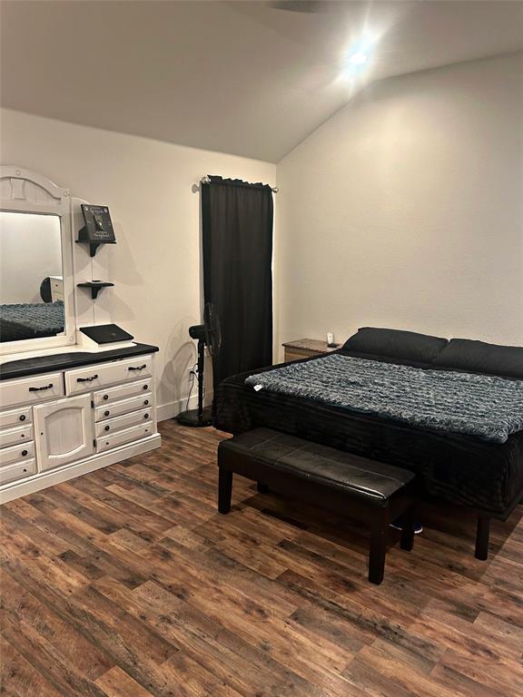 2631 Fish Tank Road Corsicana, TX 75110 - Photo 23 of 40 a bedroom with a bed and a dresser