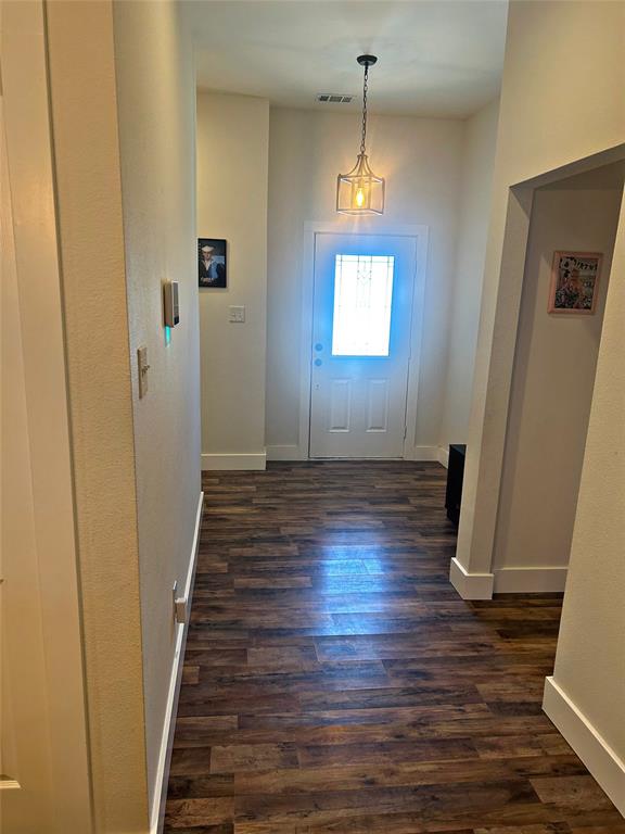 2631 Fish Tank Road Corsicana, TX 75110 - Photo 24 of 40 a view of a room with wooden floor and staircase