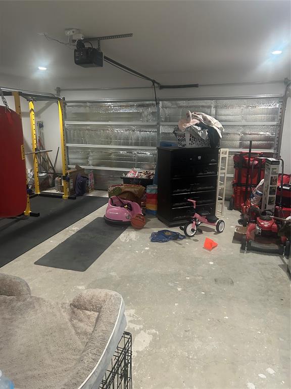 2631 Fish Tank Road Corsicana, TX 75110 - Photo 30 of 40 a view of parking garage with cars and other equipment