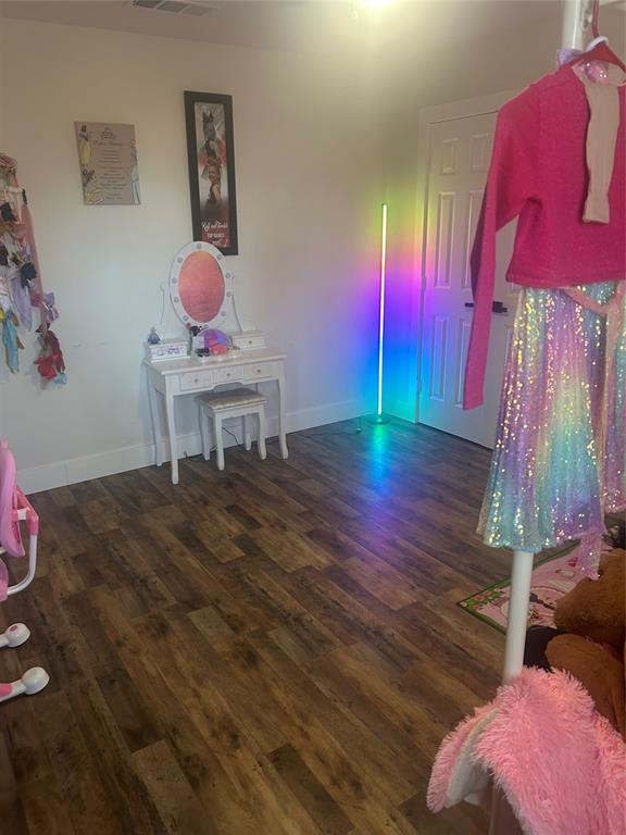 2631 Fish Tank Road Corsicana, TX 75110 - Photo 33 of 40 a view of a room with wooden floor and furniture
