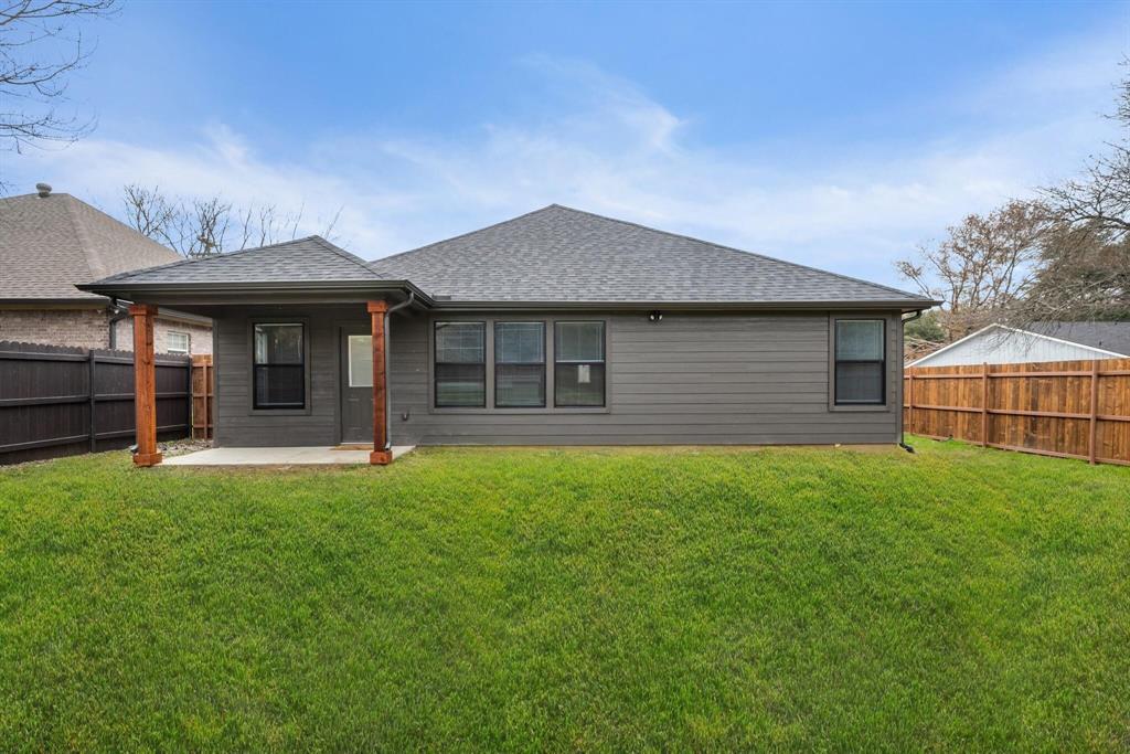 2631 Fish Tank Road Corsicana, TX 75110 - Photo 35 of 40 a front view of a house with a garden