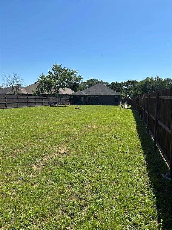 2631 Fish Tank Road Corsicana, TX 75110 - Photo 37 of 40 a view of a golf course with a lake