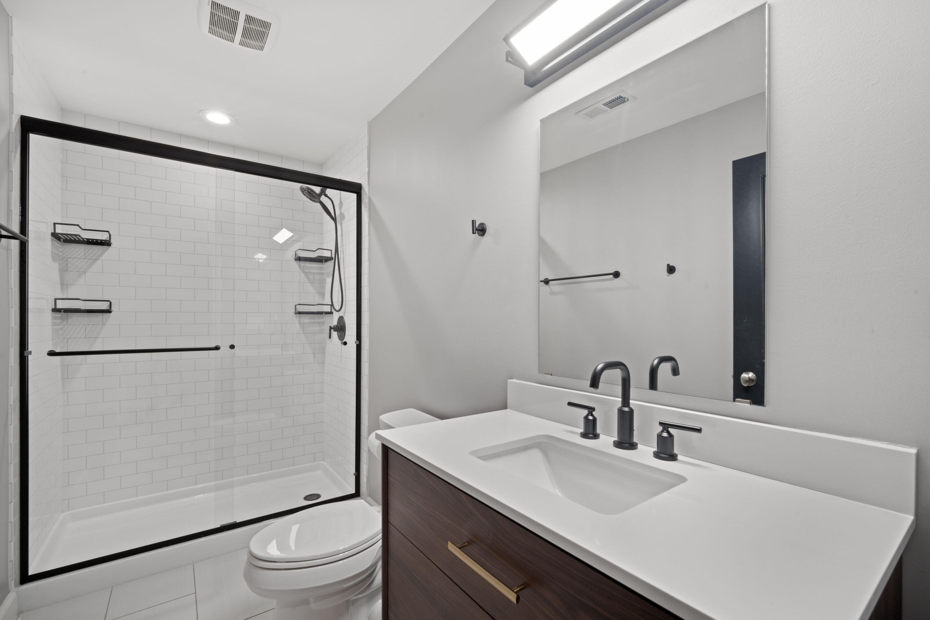 2432 North Lake Drive Milwaukee, WI 53211 - Photo 11 of 28 Ensuite bathroom to main floor bedroom