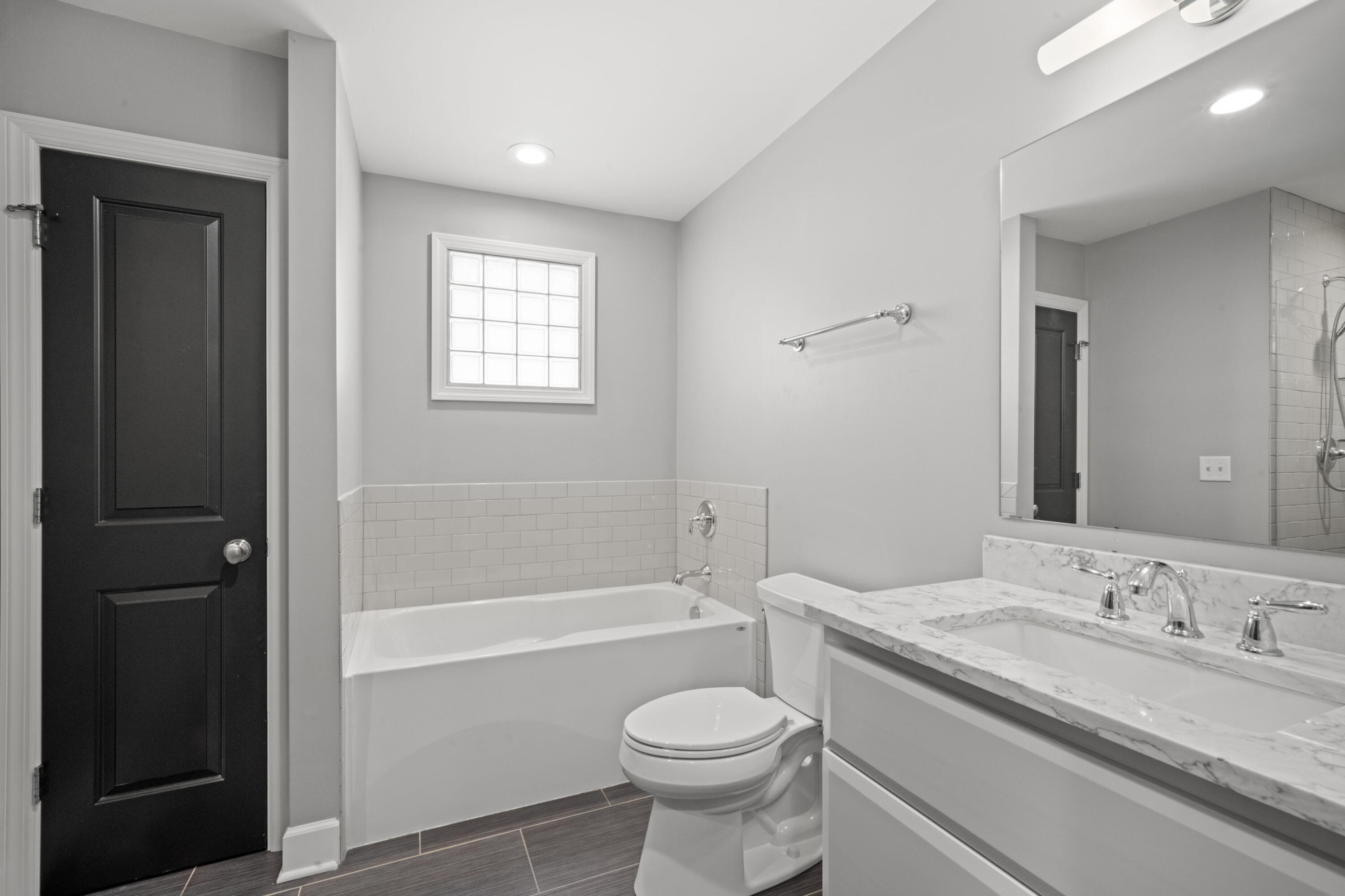 2432 North Lake Drive Milwaukee, WI 53211 - Photo 15 of 28 Upstairs full bathroom in hallway