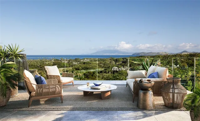 a outdoor living space with furniture and city view