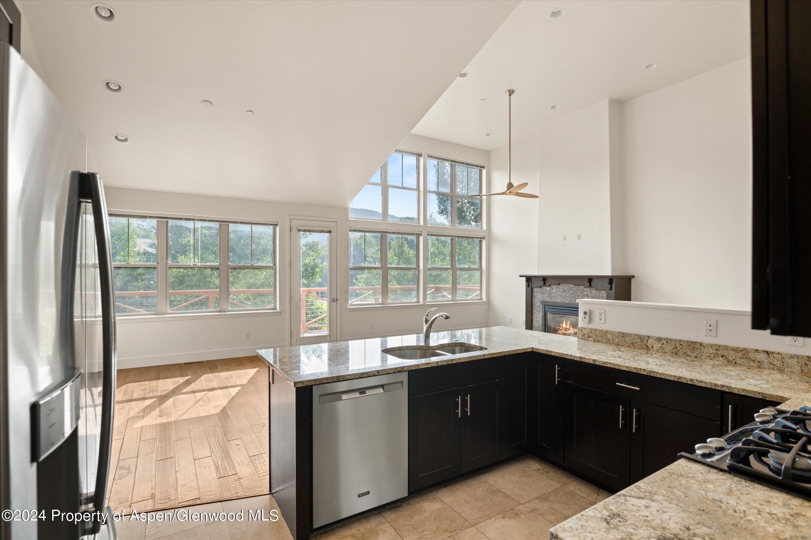 450 Jody Road Basalt, CO 81621 - Photo 11 of 22 a kitchen with a sink and a window
