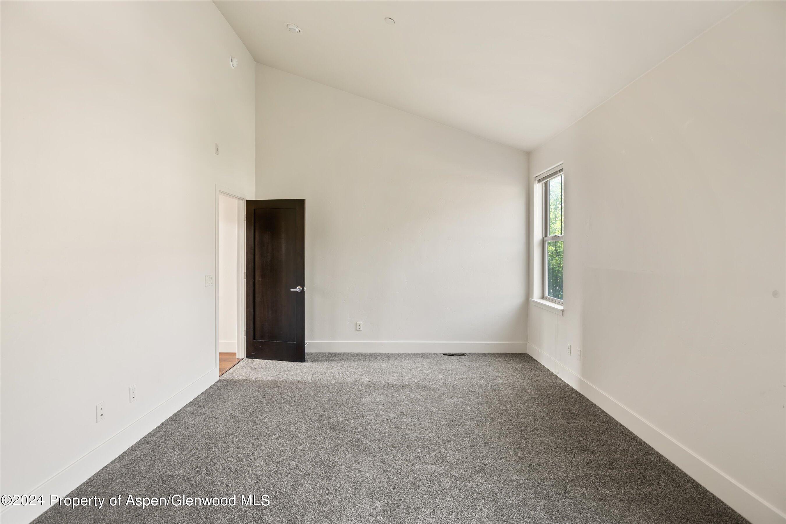 450 Jody Road Basalt, CO 81621 - Photo 12 of 22 a view of an empty room with a window