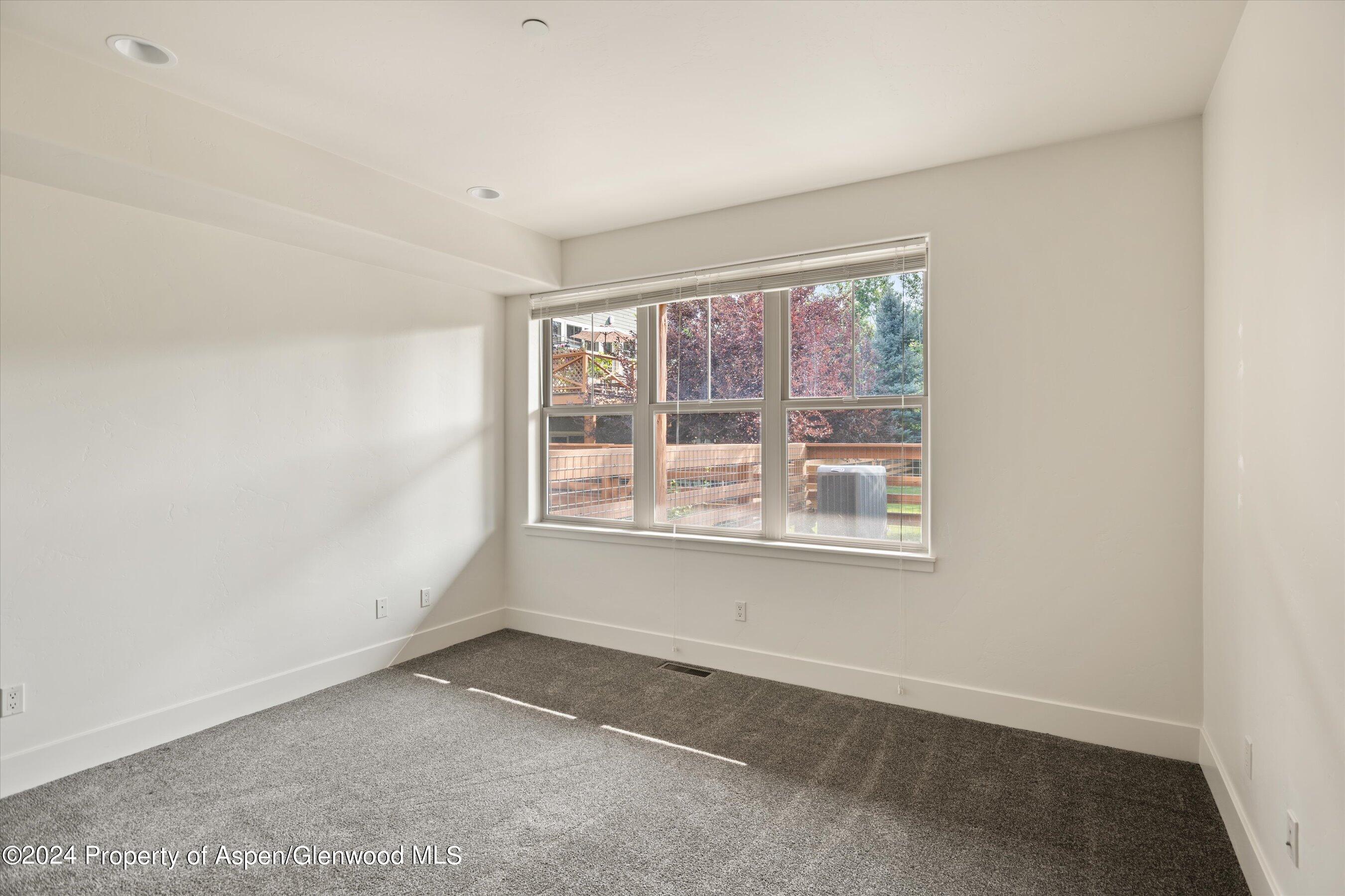 450 Jody Road Basalt, CO 81621 - Photo 15 of 22 an empty room with a window