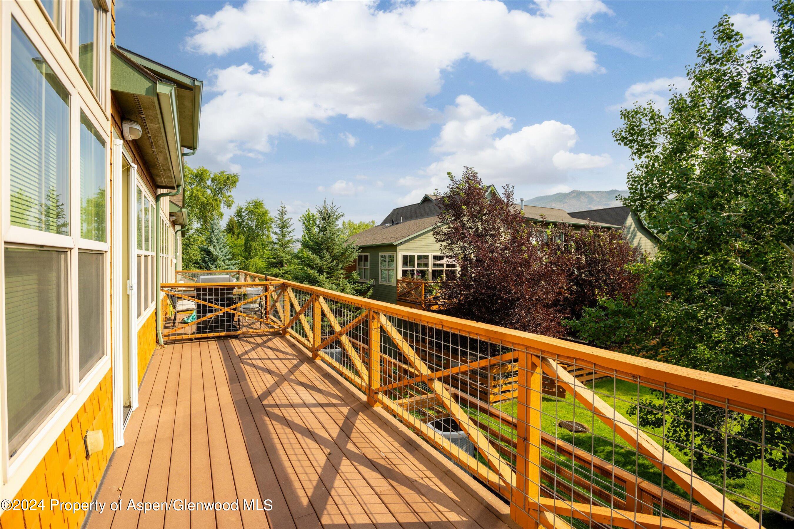 450 Jody Road Basalt, CO 81621 - Photo 19 of 22 a view of balcony with wooden floor and fence