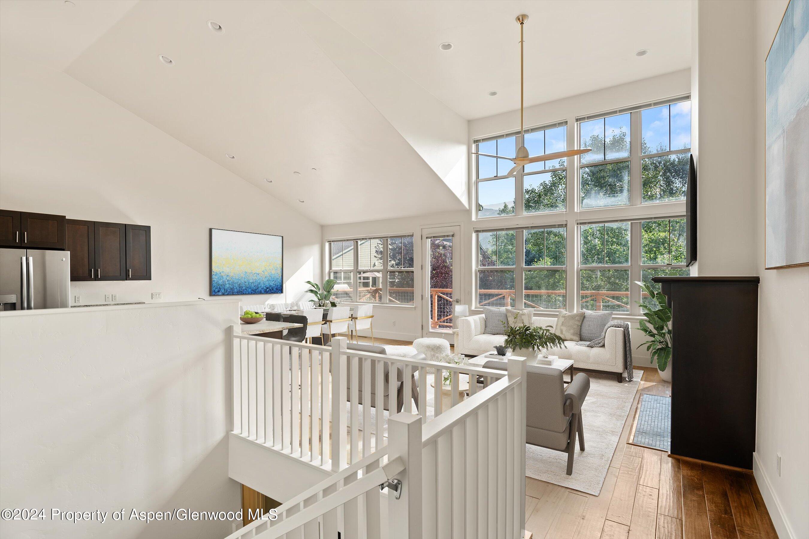 450 Jody Road Basalt, CO 81621 - Photo 3 of 22 a living room with furniture and a flat screen tv