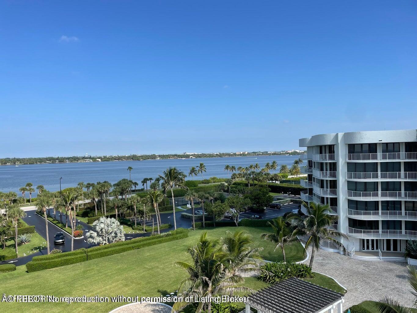 3360 South Ocean Boulevard, Unit 6CII Palm Beach, FL 33480 - Photo 12 of 12 a view of a garden with a building in the background