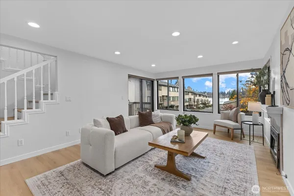 a living room with furniture and a table