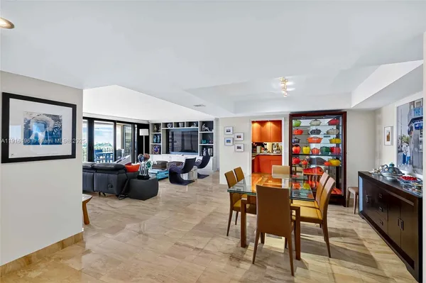 a view of a livingroom with furniture and window