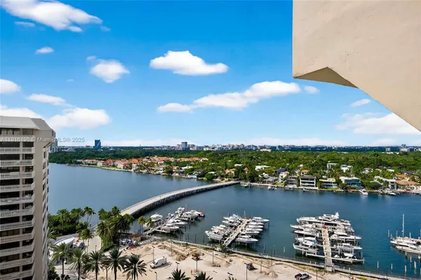 a balcony with an outdoor seating