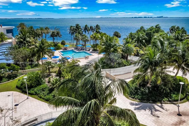 a view of a balcony with chairs