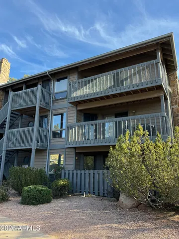 a view of a table and chairs in patio