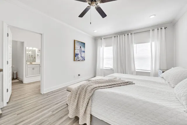 a bathroom with a sink a shower and a mirror