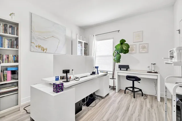 a living room with furniture and windows
