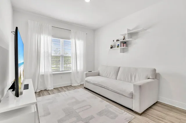 a bathroom with a tub and shower
