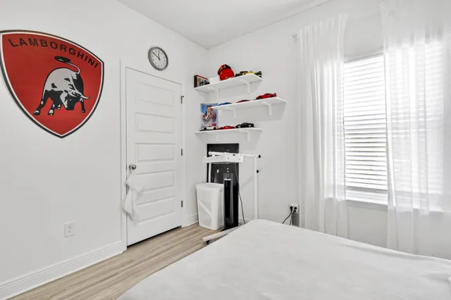 a bedroom with a bed and a closet