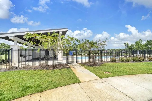 an aerial view of a house with a garden