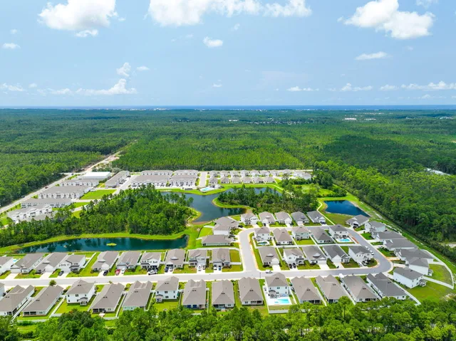 an aerial view of a house with garden