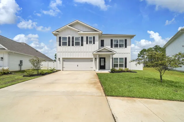 a view of livingroom with furniture and wooden floor