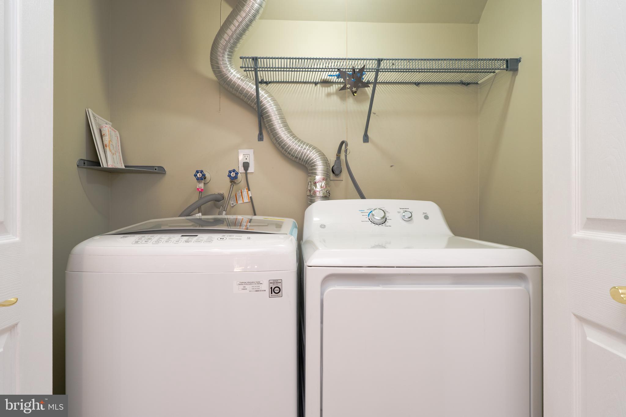 2011 Pieris Court Vienna, VA 22182 - Photo 16 of 39 a utility room with dryer and washer