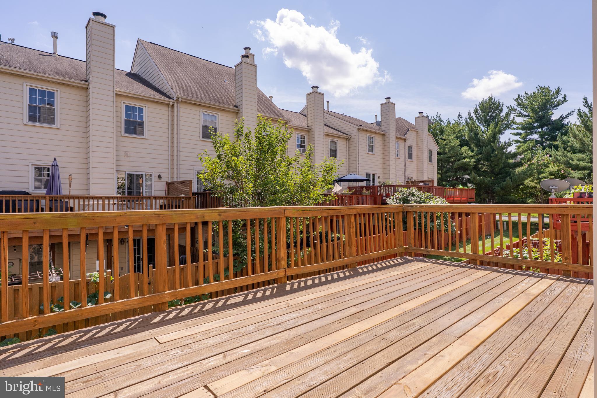 2011 Pieris Court Vienna, VA 22182 - Photo 37 of 39 a balcony with wooden floor and city view