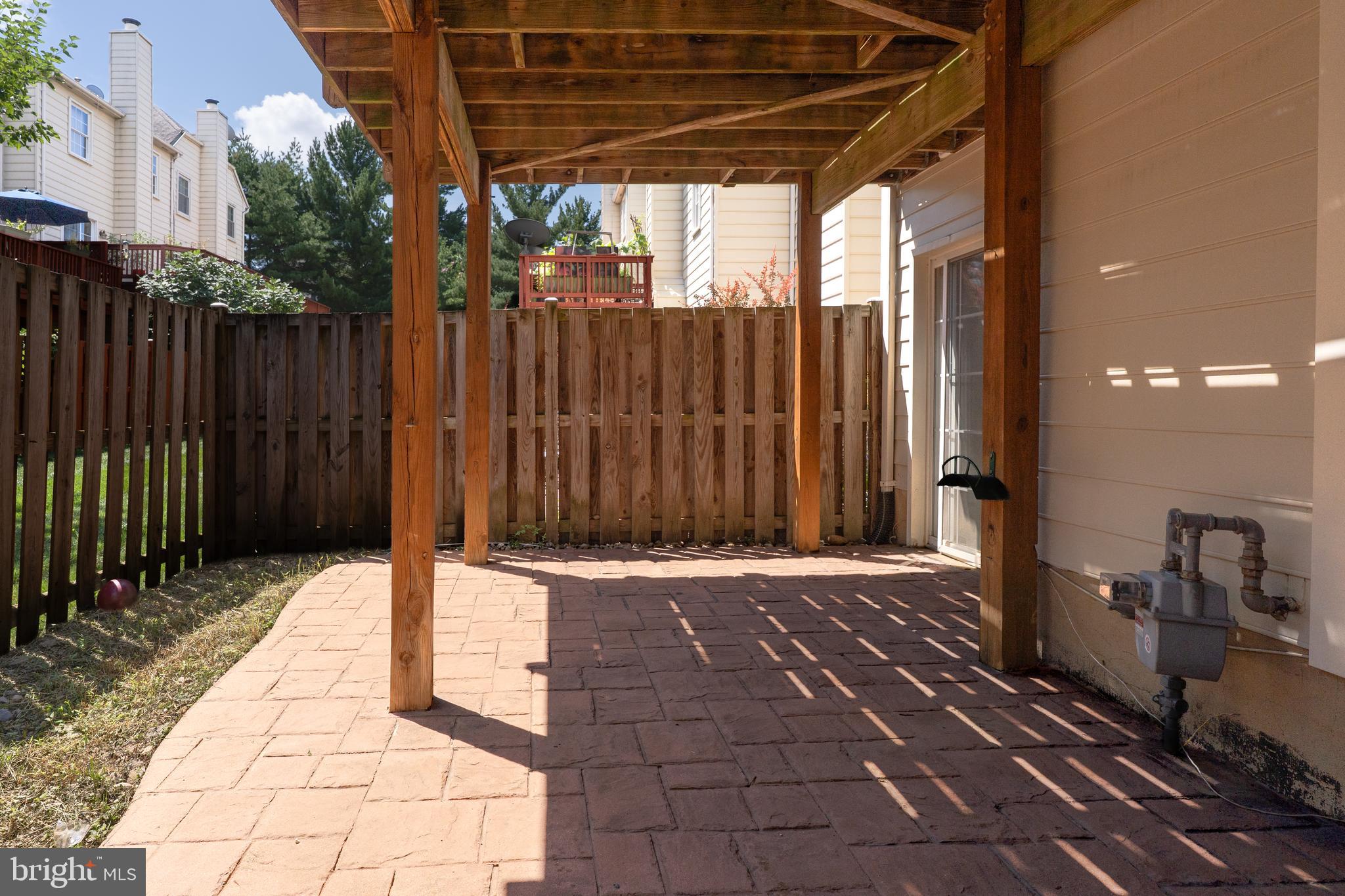 2011 Pieris Court Vienna, VA 22182 - Photo 39 of 39 a view of backyard with wooden fence