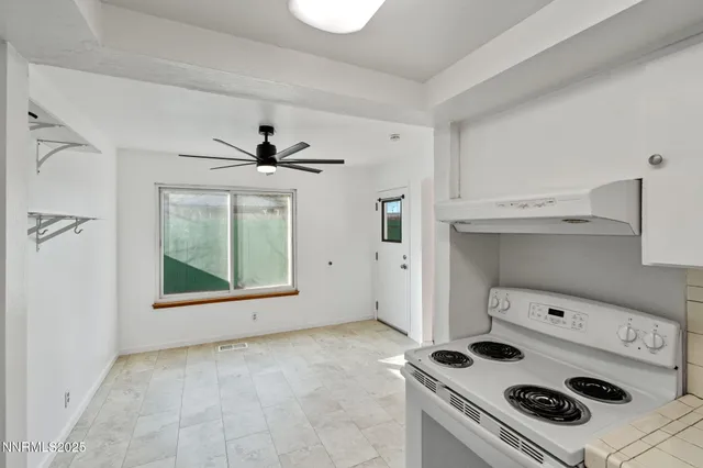 a view of livingroom with washer and dryer