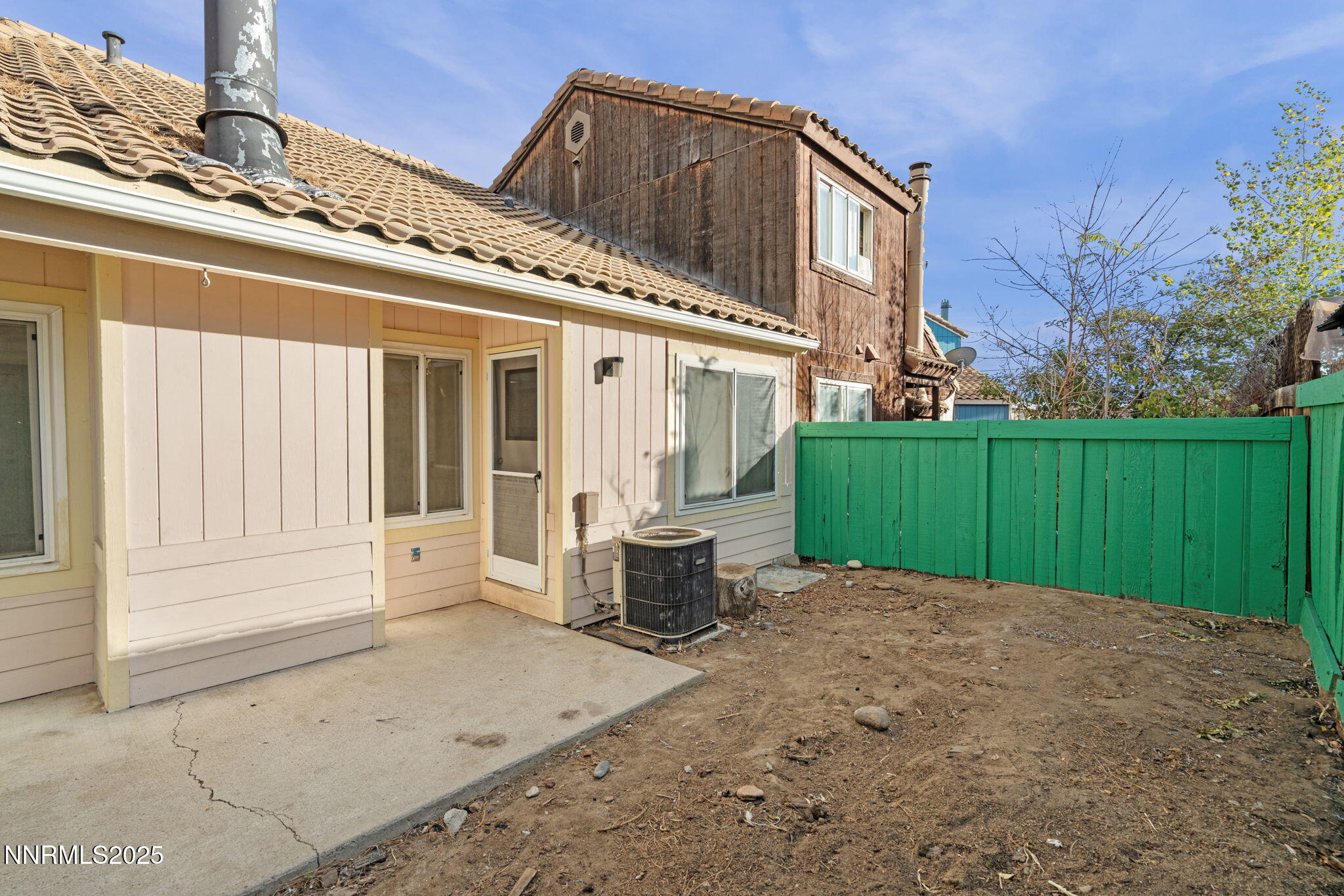 1889 Merchant Street Sparks, NV 89431 - Photo 26 of 28 a view of a house with backyard and sitting area