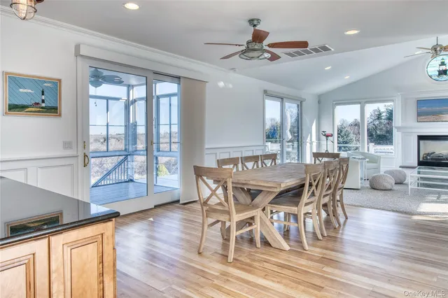 a view of a chairs and table on the wooden floor
