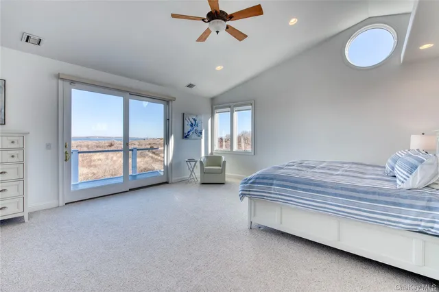 a room with a chair and a window