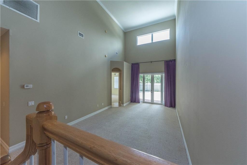 1855 Bridgepointe Circle, Unit 21 Vero Beach, FL 32967 - Photo 11 of 35 a view of an empty room with a window