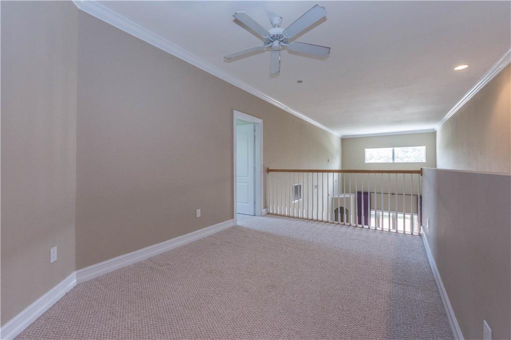 1855 Bridgepointe Circle, Unit 21 Vero Beach, FL 32967 - Photo 18 of 35 a view of an empty room