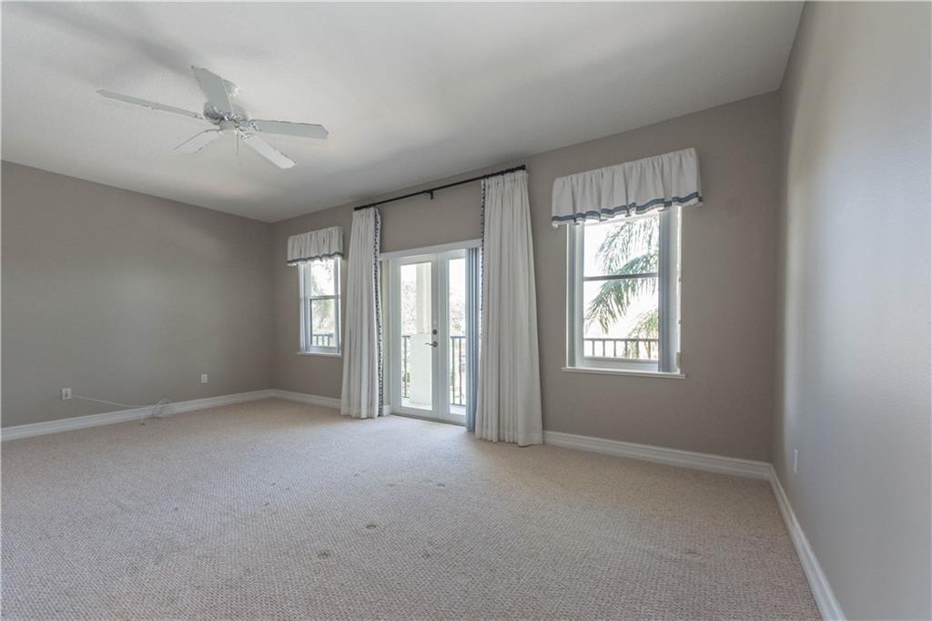 1855 Bridgepointe Circle, Unit 21 Vero Beach, FL 32967 - Photo 23 of 35 a view of an empty room with a window