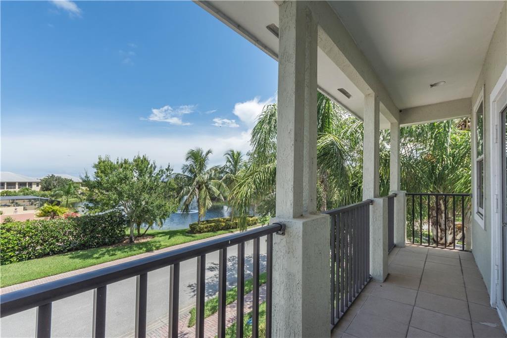 1855 Bridgepointe Circle, Unit 21 Vero Beach, FL 32967 - Photo 26 of 35 a view of a balcony with lake view