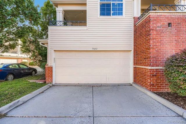 a view of a house with a garage