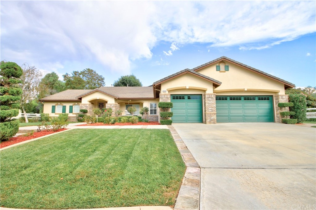 30099 Corte Coelho Temecula, CA 92591 - Photo 1 of 47 front view of a house with a yard
