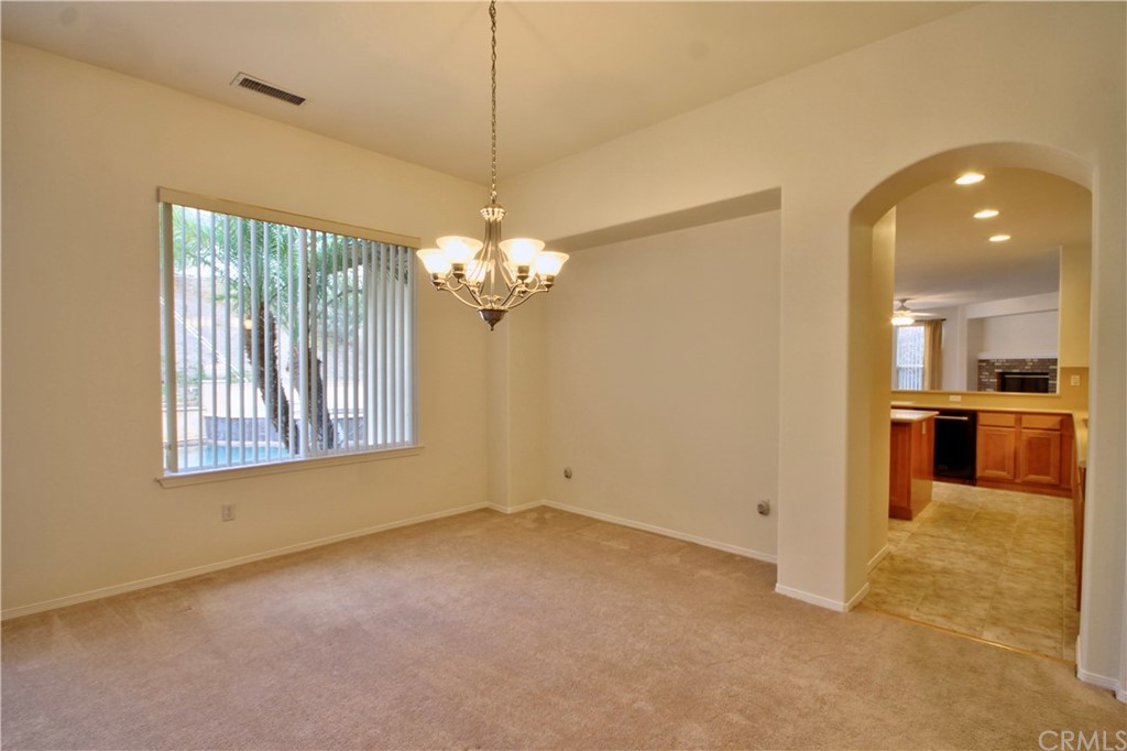 30099 Corte Coelho Temecula, CA 92591 - Photo 14 of 47 a view of a livingroom with a chandelier kitchen and chandelier