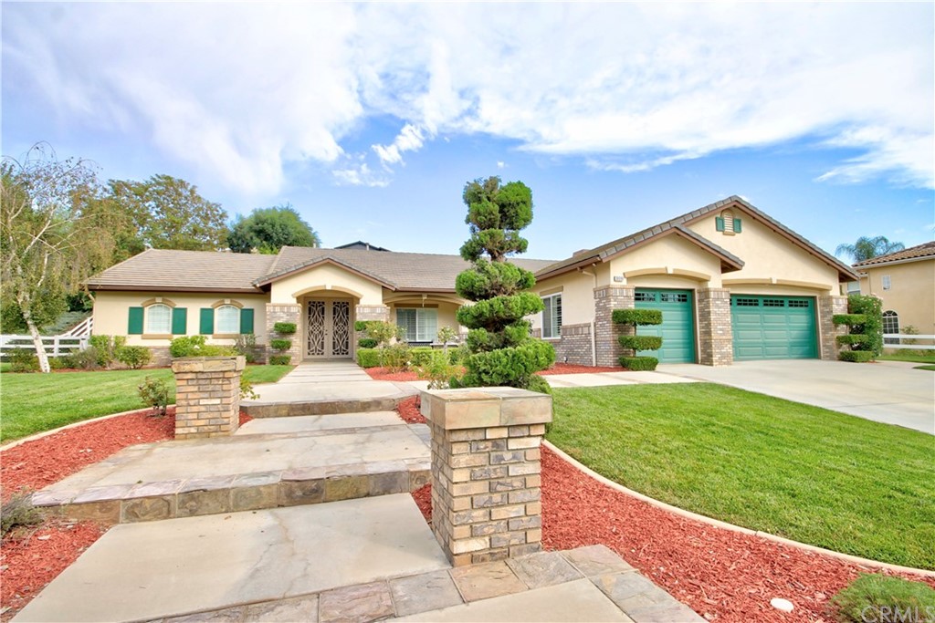30099 Corte Coelho Temecula, CA 92591 - Photo 3 of 47 a front view of a house with garden