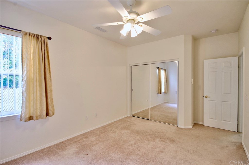 30099 Corte Coelho Temecula, CA 92591 - Photo 28 of 47 an empty room with windows and fan