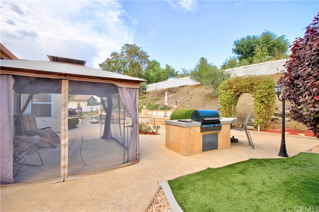 30099 Corte Coelho Temecula, CA 92591 - Photo 39 of 47 a view of a backyard with patio