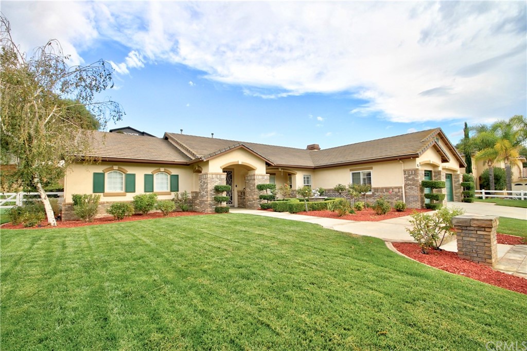 30099 Corte Coelho Temecula, CA 92591 - Photo 5 of 47 a view of a house with a big yard and large trees