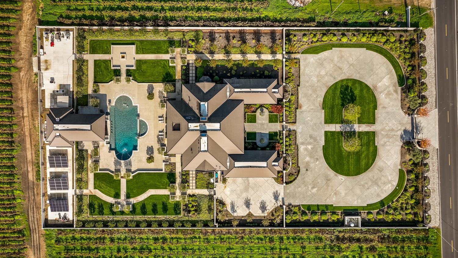 22215 Devries Road Lodi, CA 95242 - Photo 13 of 99 an aerial view of a swimming pool with outdoor seating and yard