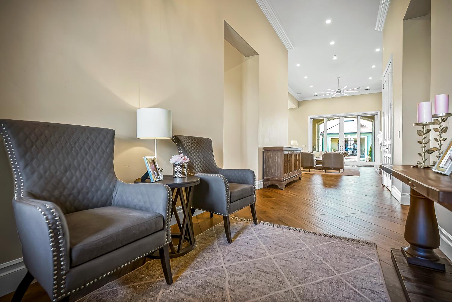 22215 Devries Road Lodi, CA 95242 - Photo 20 of 99 a living room with furniture and wooden floor